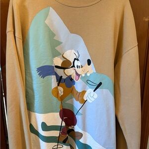 Disney Tan Sweatshirt with Goofy Skiing Graphic